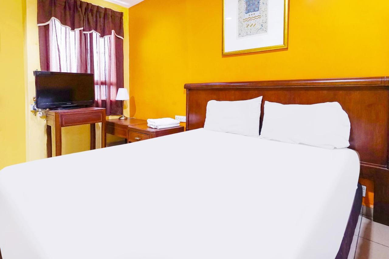 Oyo 90486 New Station Hotel Klang Extérieur photo