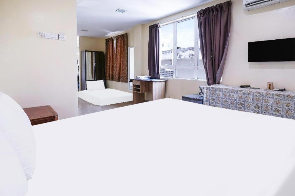 Oyo 90486 New Station Hotel Klang Extérieur photo