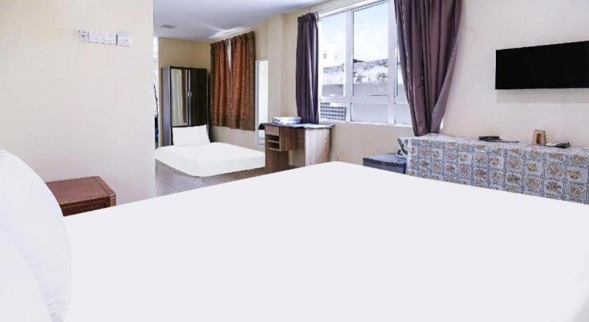 Oyo 90486 New Station Hotel Klang Extérieur photo